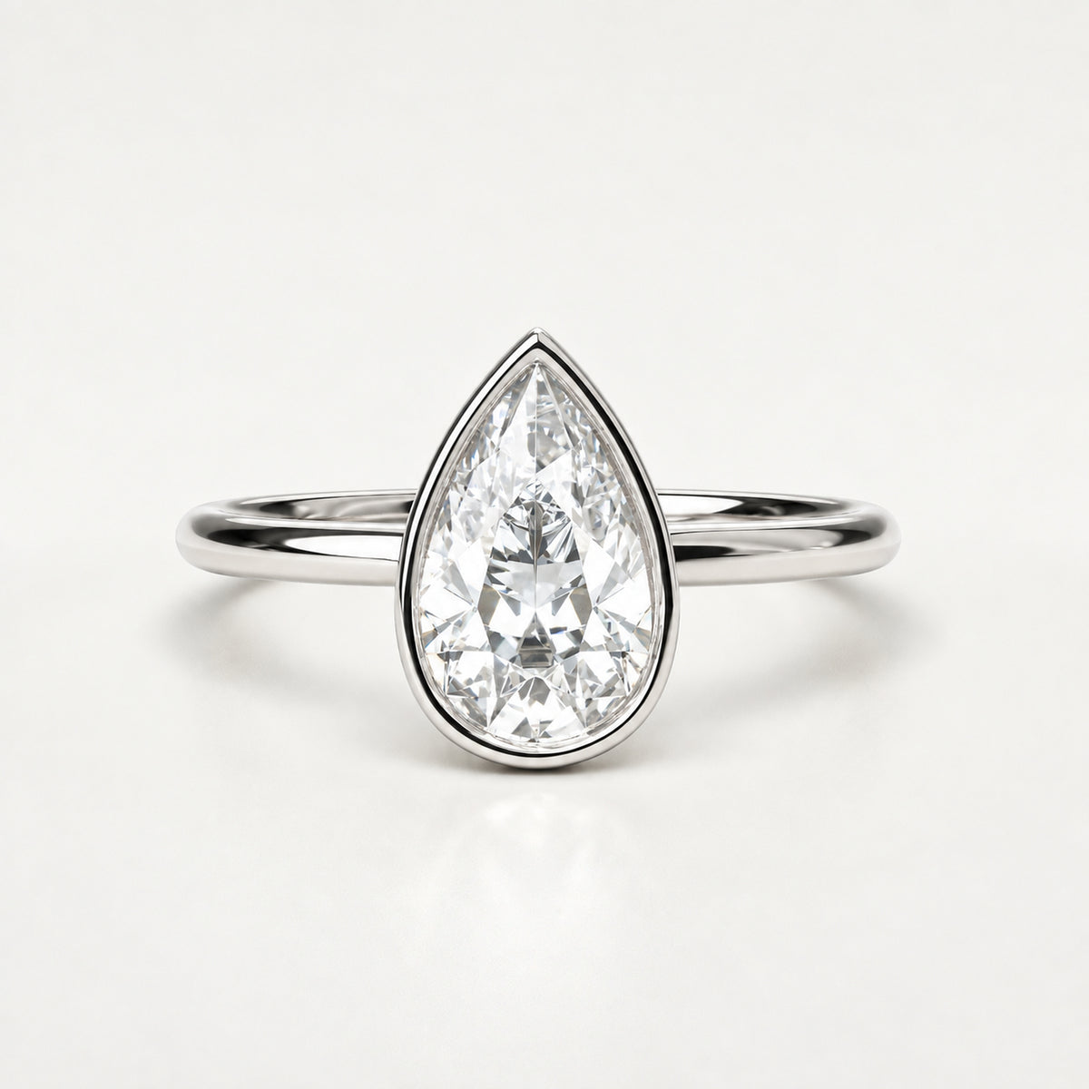 The Flow pear-cut lab-grown diamond bezel ring — White Gold, front view