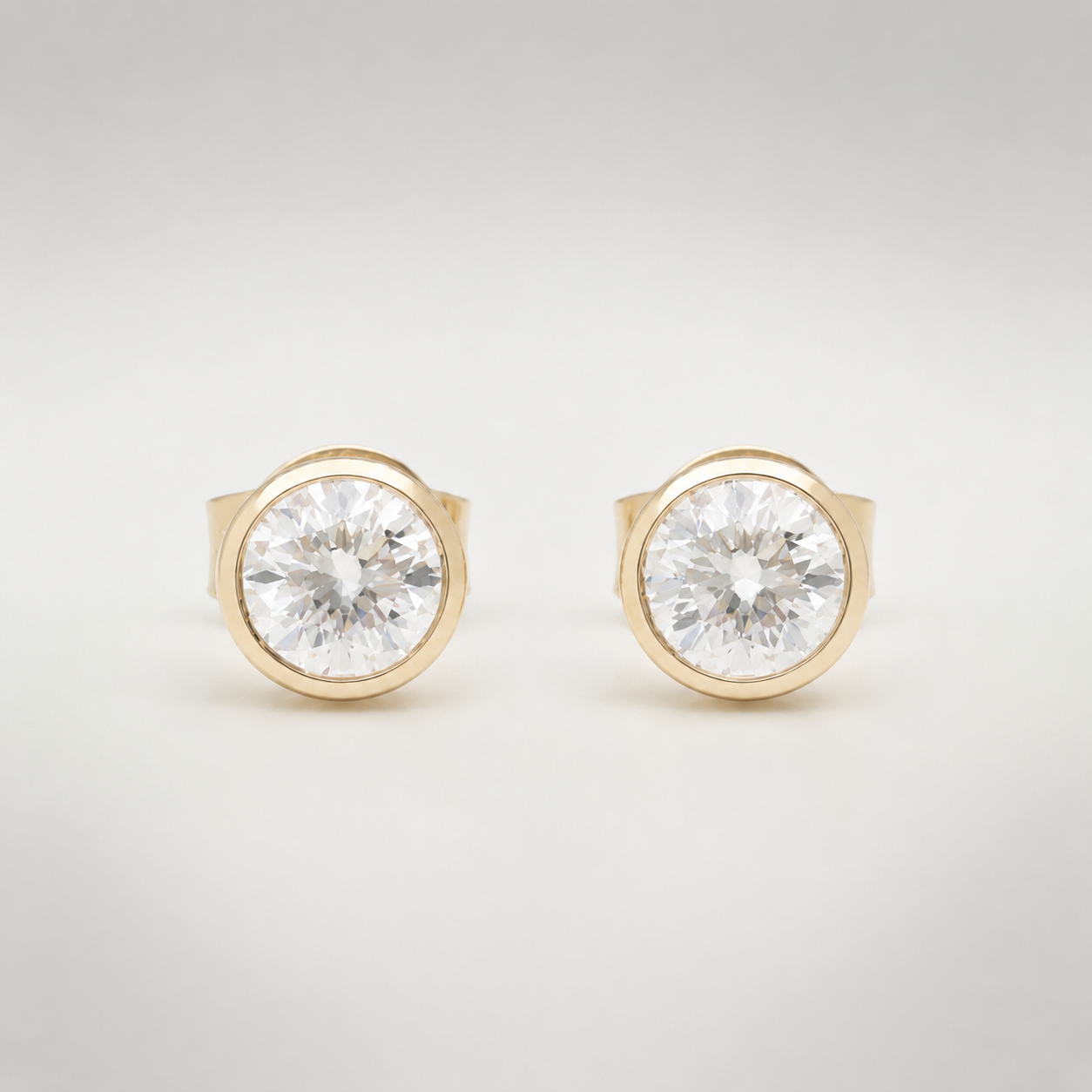 1.0 ct Round Bezel Stud Earrings – 14K Yellow Gold