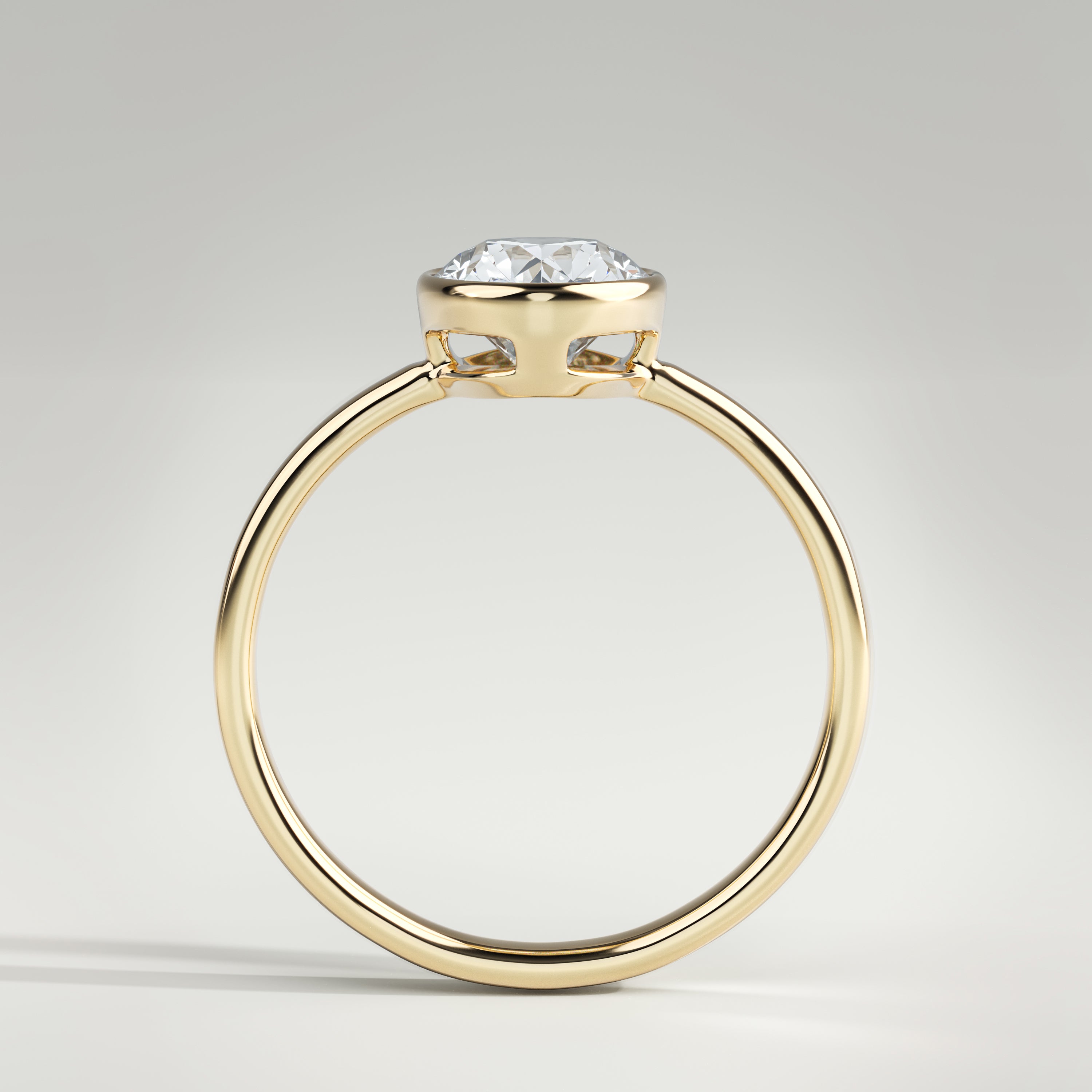1.5 ct Oval Bezel Ring – 14K Yellow Gold