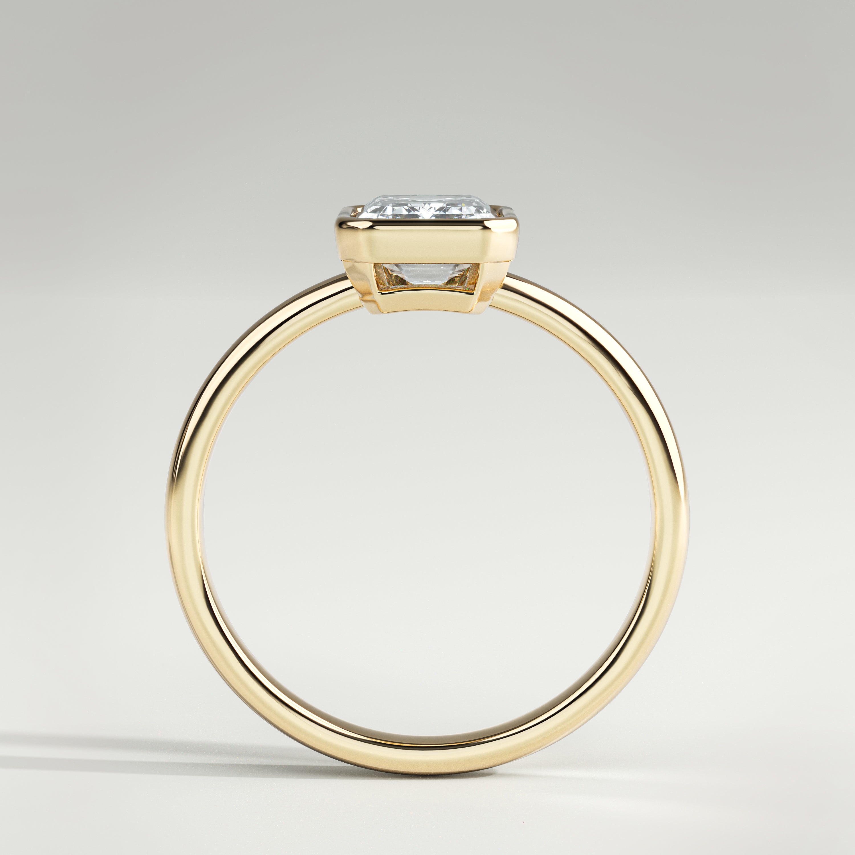 1.5 ct Emerald Bezel Ring – 14K Yellow Gold